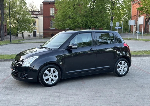 Suzuki Swift cena 16900 przebieg: 121000, rok produkcji 2009 z Gniezno małe 497